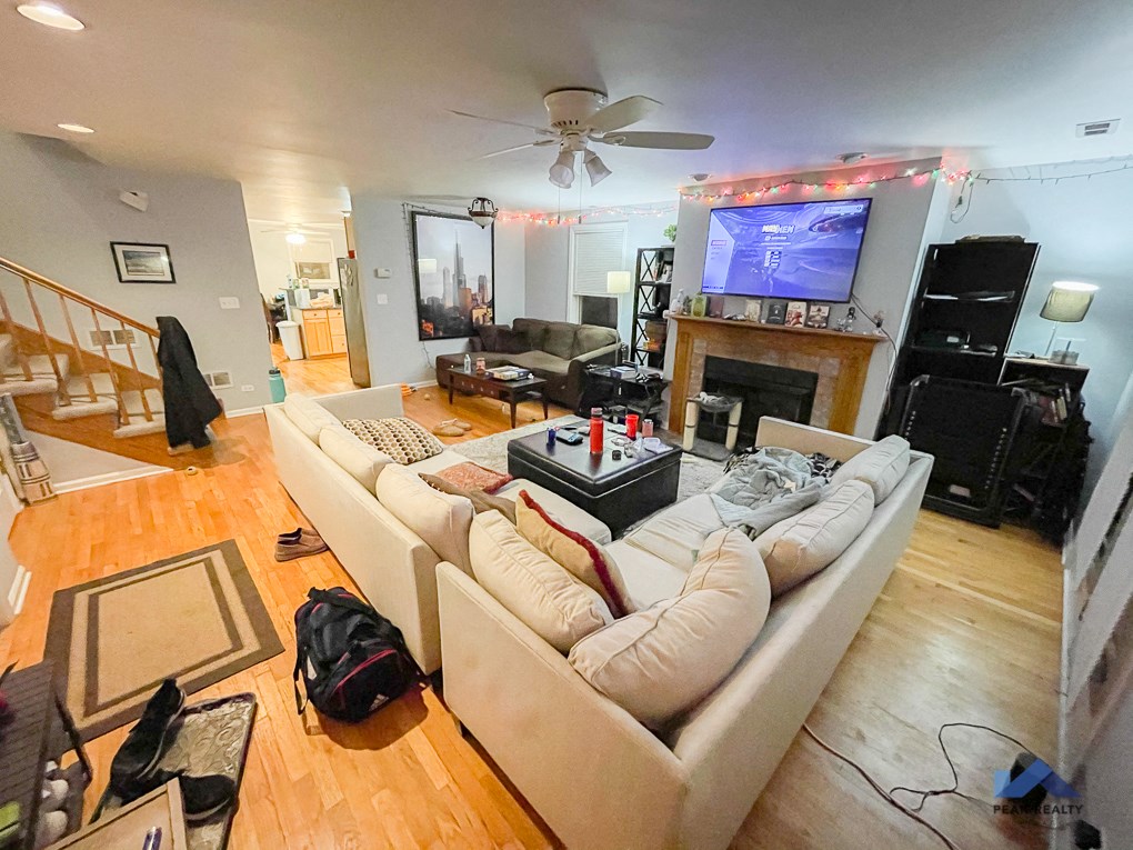 a living room with a couch and a tv