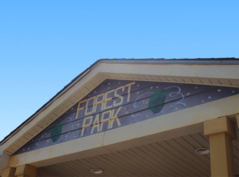 a sign on the front of a building that reads fossil dark