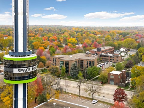 A view of a campus from a high vantage point with a Space Tower in the foreground.