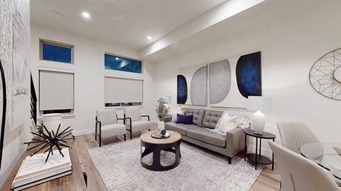 a living room with a couch and a table