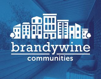 a blue graphic of a city with the words brandywine communities