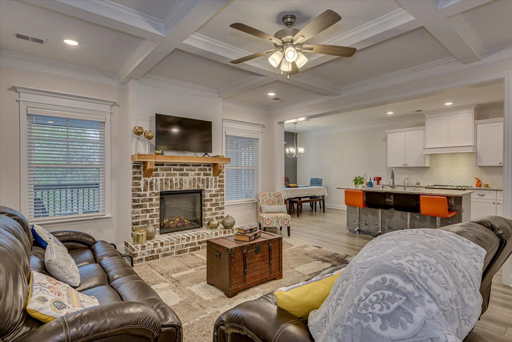 a living room with a couch and a fireplace