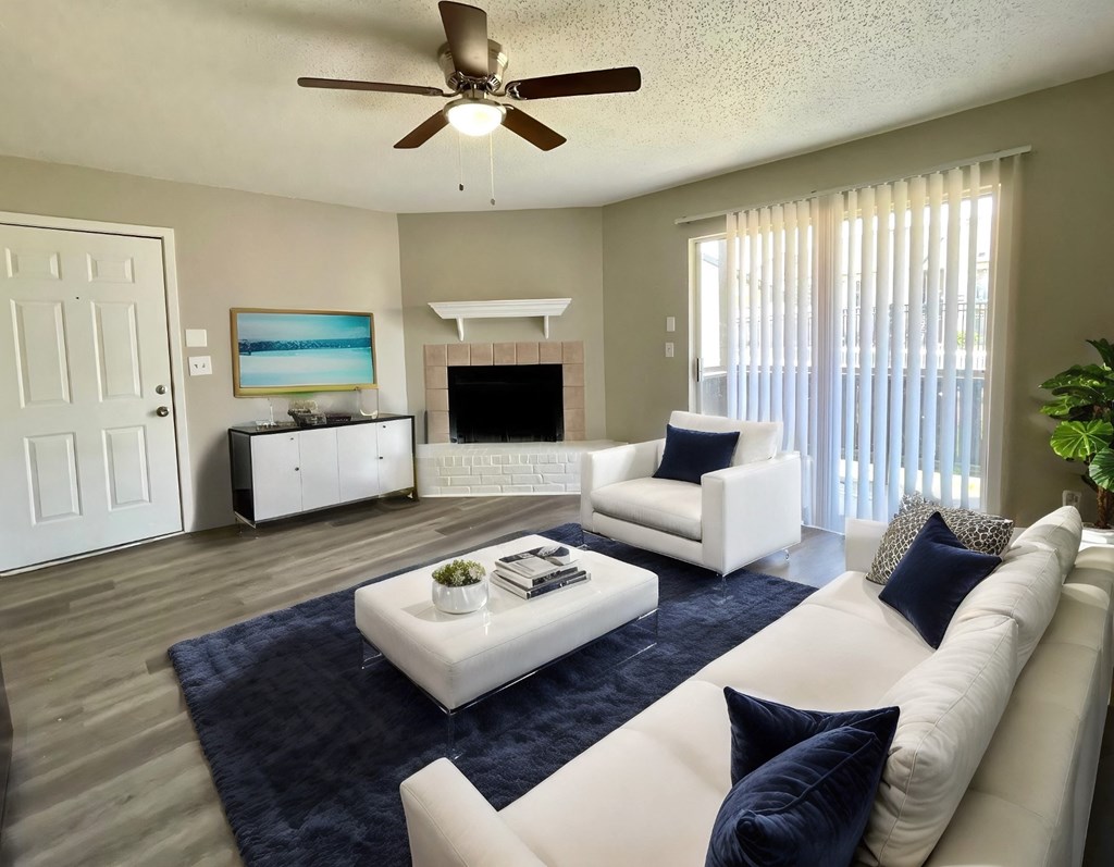 a living room with a white couch and a coffee table