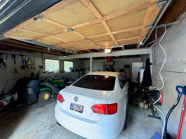 a white car parked in a garage