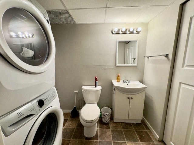 a bathroom with a toilet and a washing machine