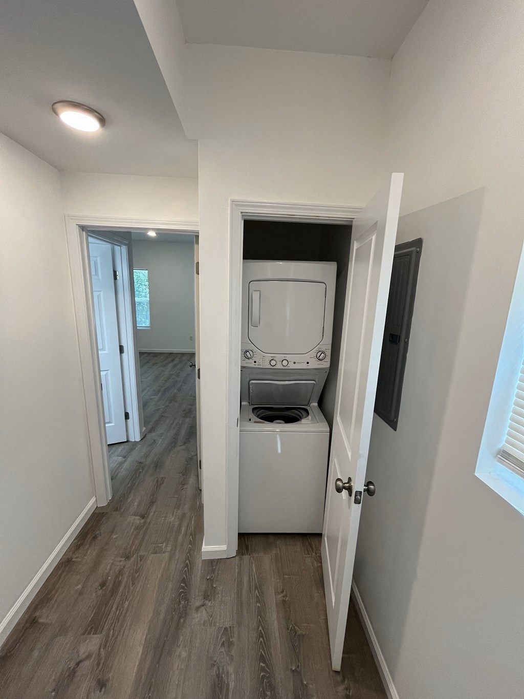 a small laundry room with a washer and dryer in it