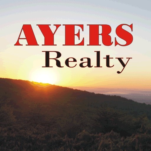 the sun setting over the mountains with the wordsayers realy