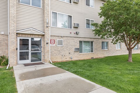 A building with a red sign that says B on it.