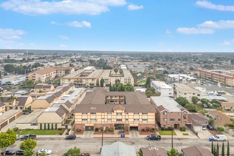 A large building with a parking lot in front of it.