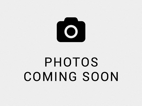 A placeholder image with a camera icon and the text "Photos Coming Soon".