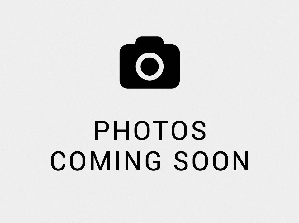 A placeholder image with a camera icon and the text "Photos Coming Soon".