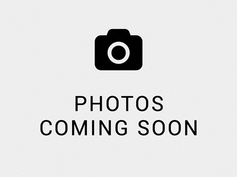 A placeholder image with a camera icon and the text "Photos Coming Soon".