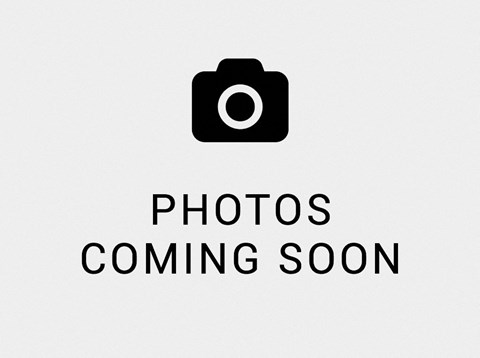 A placeholder image with a camera icon and the text "Photos Coming Soon".