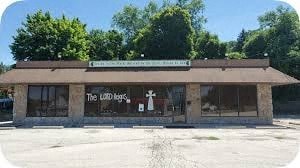 A building with a sign that reads "The Loff Legs".