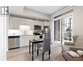 A kitchen with white cabinets and stainless steel appliances.