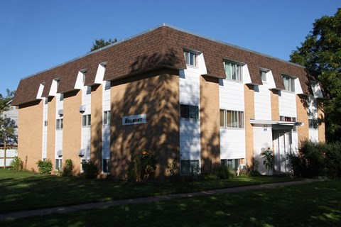 A building with a sign that says Belmont on it.