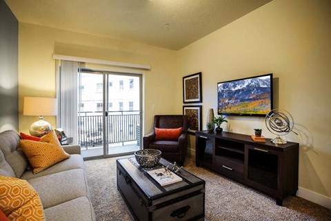 a living room with a couch and a television