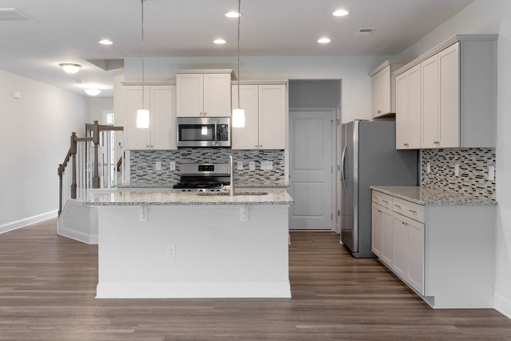 A kitchen with a countertop and cabinets.