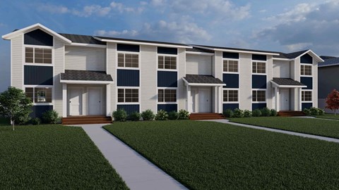 A modern two-story apartment building with a white and dark blue exterior.