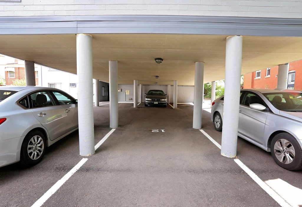 a parking garage with cars parked in it
