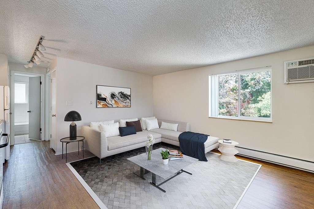 a living room with a couch and a table