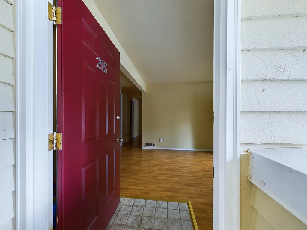 A red door with the number 25 on it.