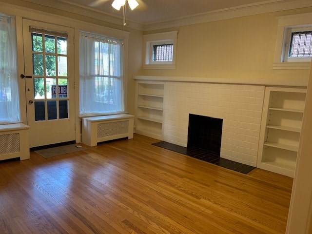 A room with a fireplace and a window.