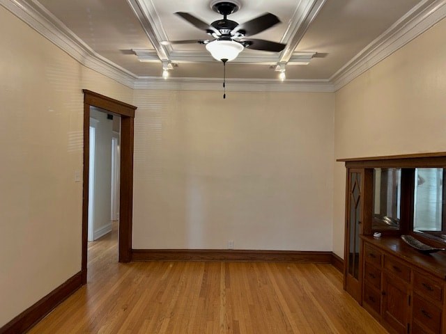 A room with a ceiling fan and wooden floors.