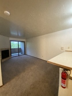 A room with a fire extinguisher on the wall.