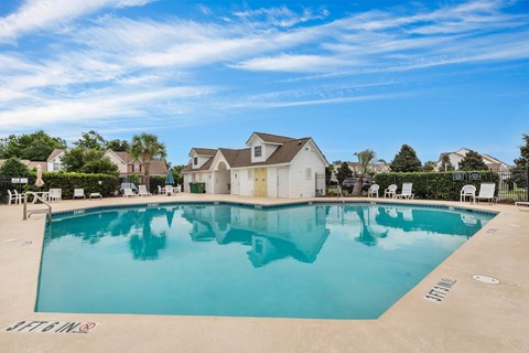 A large swimming pool with the name "JETS" written on the ground.