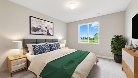 A bedroom with a large bed and a window showing a view of a green landscape.