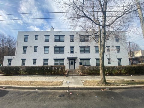 A white building with the number 424 on it.