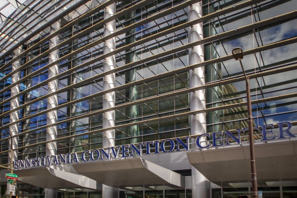 Pennsylvania Convention Center building with a blue sky in the background.