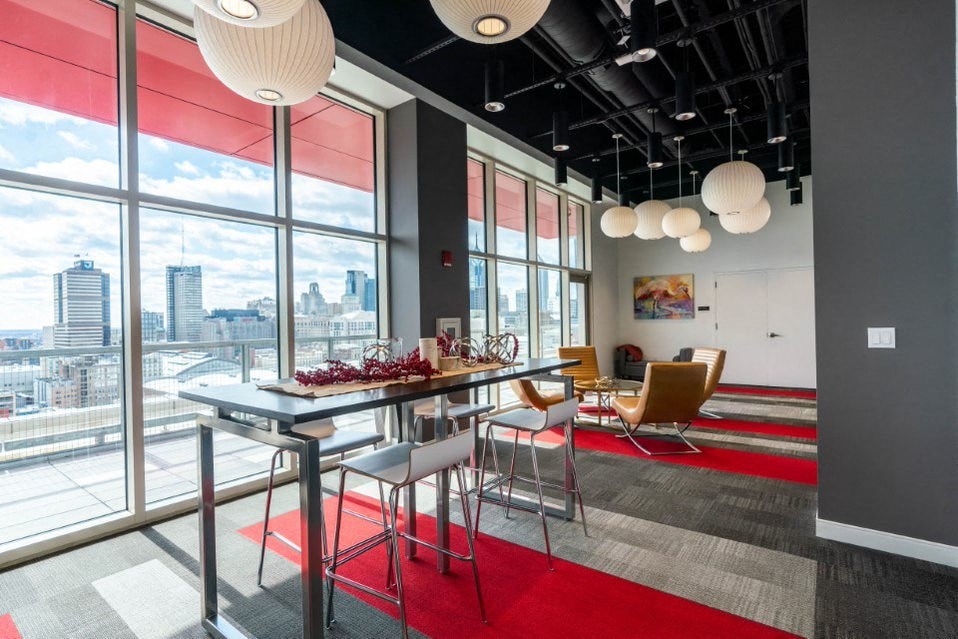 A modern office space with a view of the city skyline.