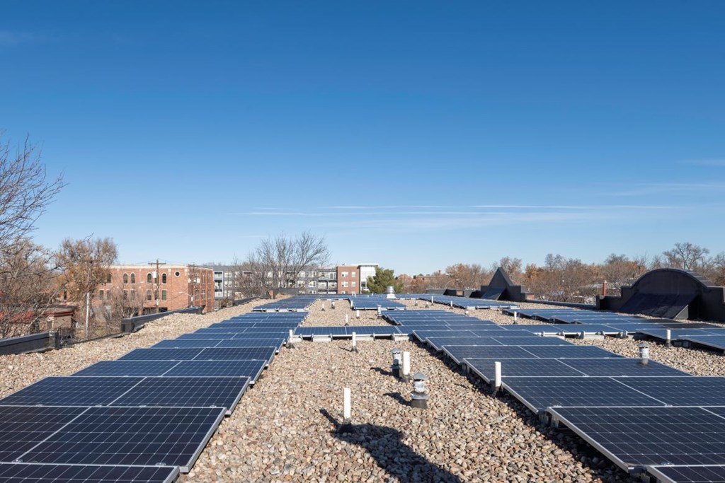 A rooftop with solar panels installed.