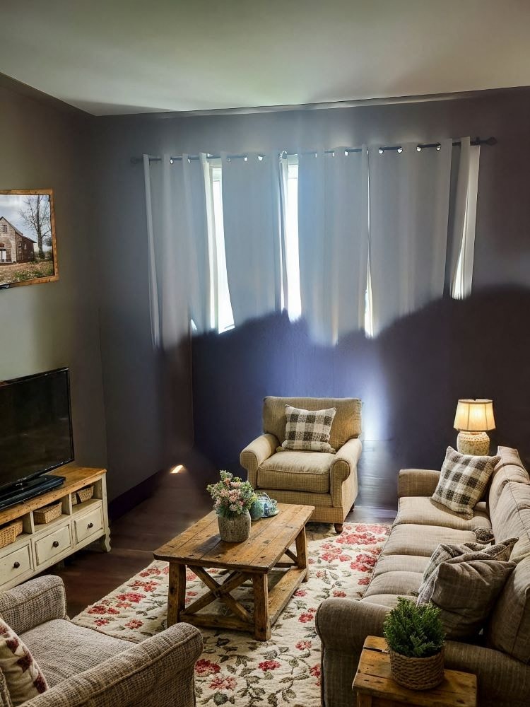 A living room with a couch, chair, and coffee table.