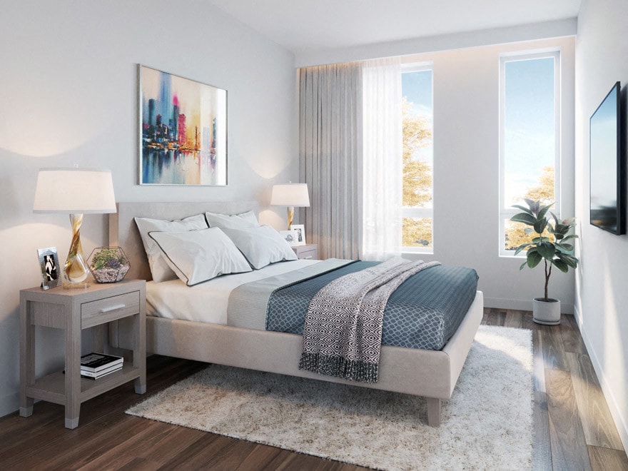A bedroom with a large bed, a side table with a lamp, and a painting on the wall.