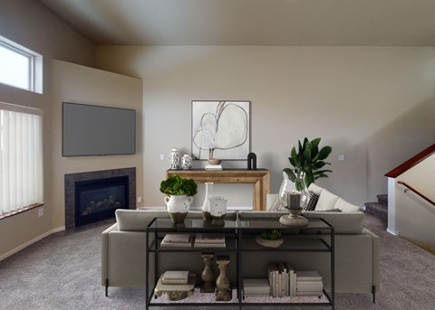 A living room with a fireplace, a sofa, and a coffee table.