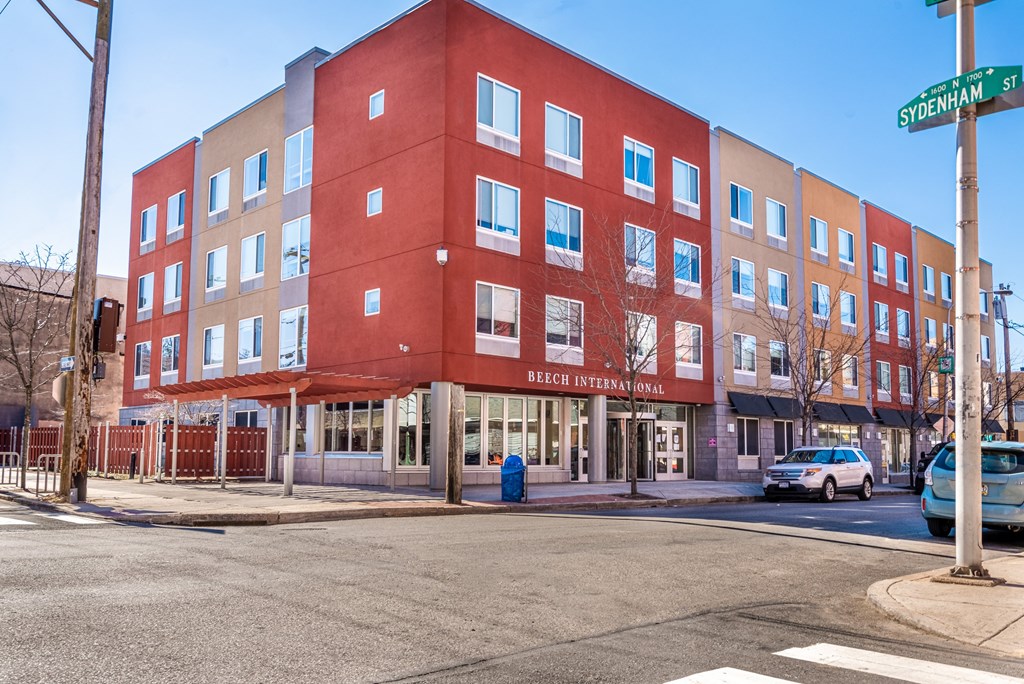 A red building with the words "Beech International" on the front.