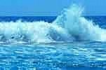A wave is crashing in the ocean.