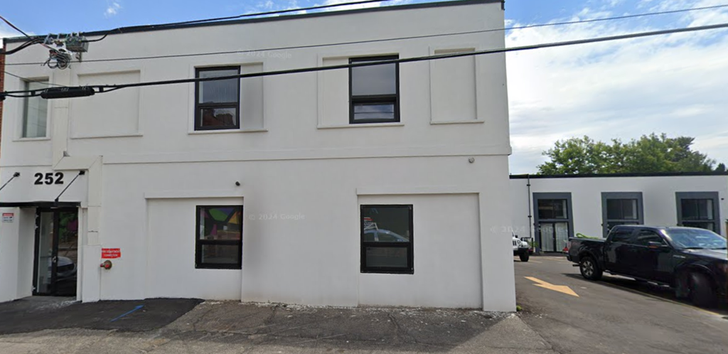 A white building with the number 252 on it.