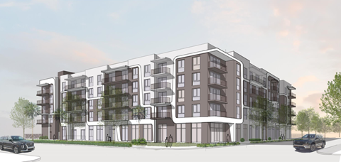 A modern apartment building with balconies and multiple stories.