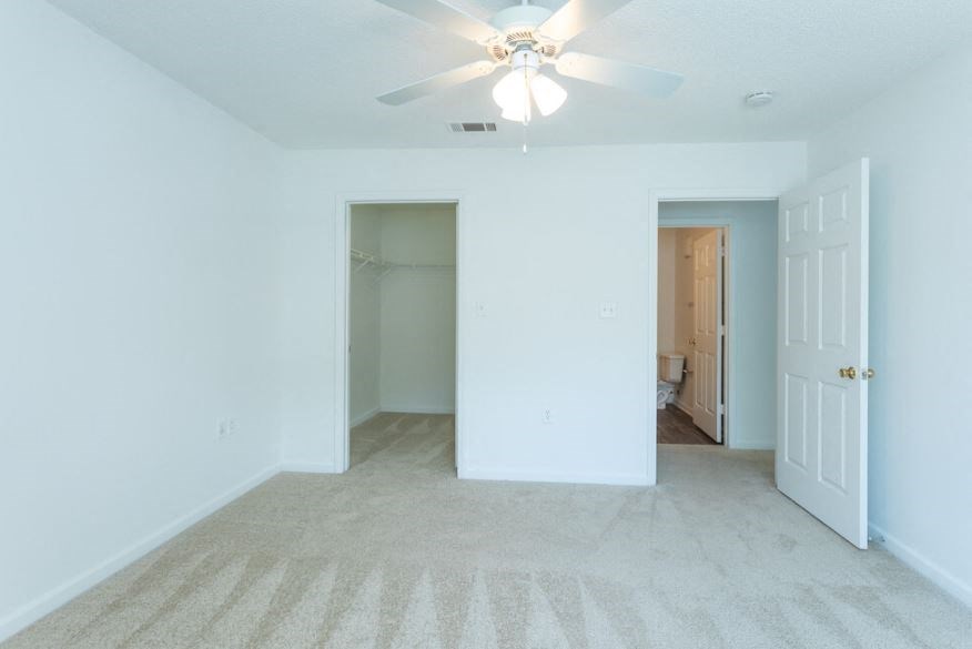 Carpeted Bedroom at Granville Oaks Apartment Homes, Creedmoor, NC 27522