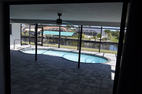 A pool with a fence around it.