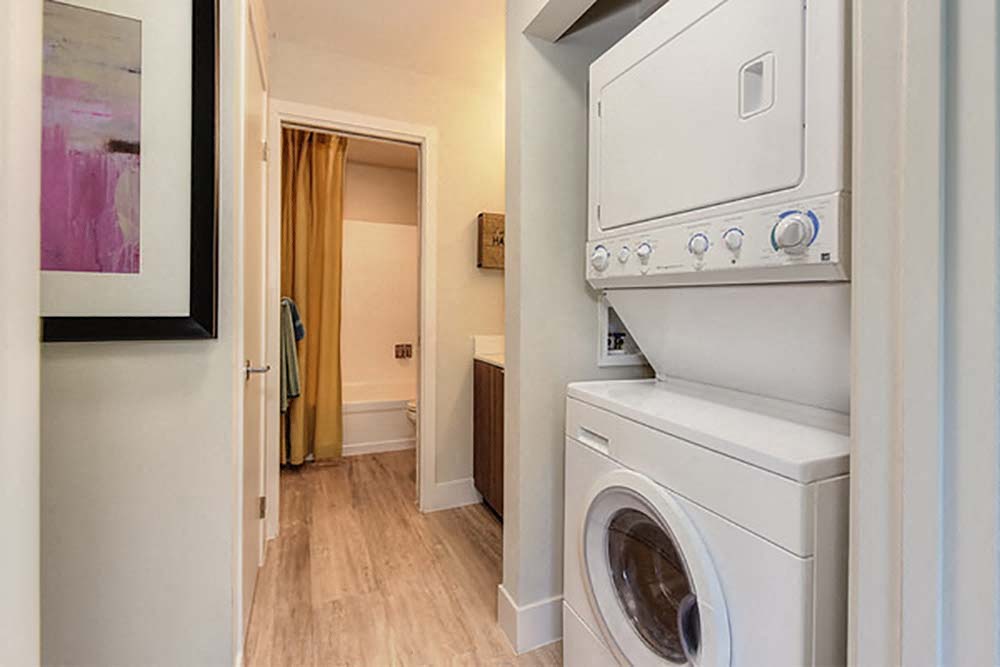 Washer and dryer by bathroom l Citra