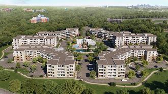 an aerial view of the apartment complex and surrounding neighborhoods