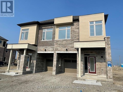 A two-story house under construction by Bay Street Group Inc.