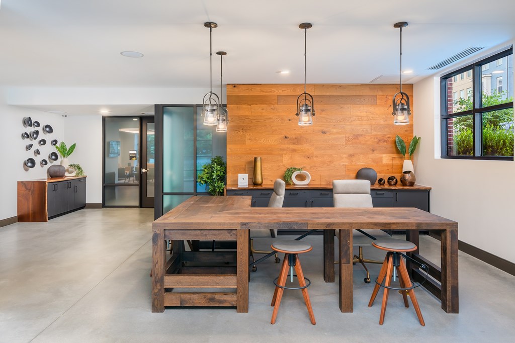Resident lounge with table chairs and barstools
