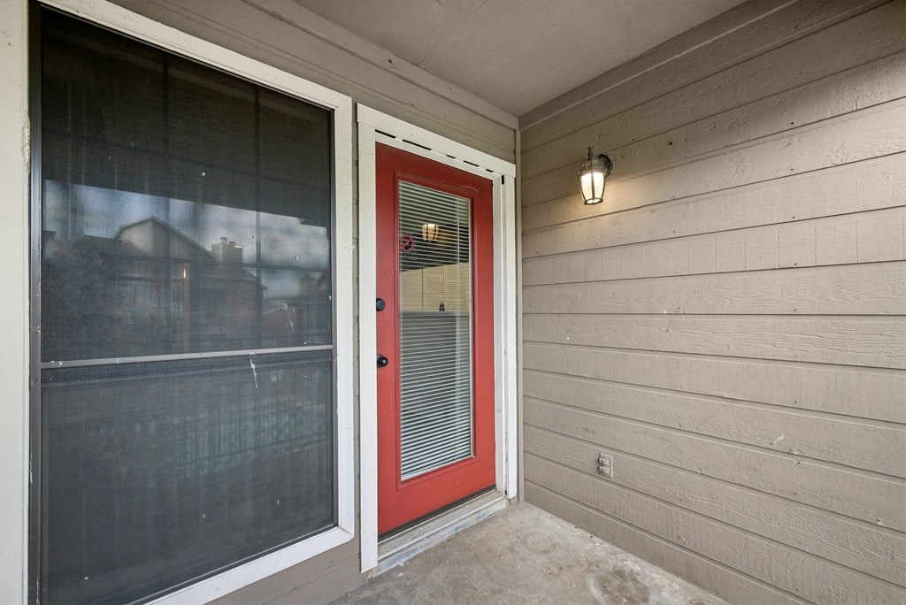 A bathroom with a sink, toilet, and bathtub.