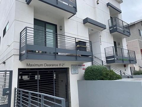 A building with a sign that says Maximum Clearance 8'2".